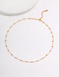 THE PETIT POINT NECKLACE